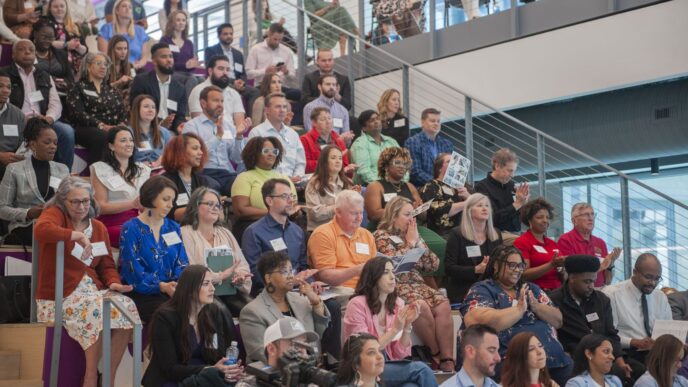 Crowd of attendees listening to talk at TechRising Summit April 23rd 2024