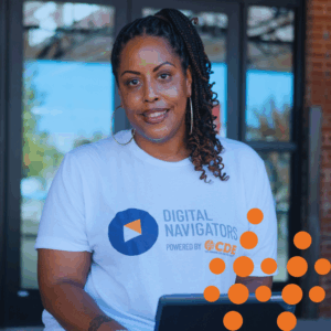 Photo of Digital Navigator, Jeanelle, with laptop.
