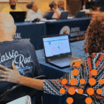 Two community members at a skilling class.